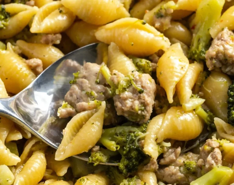 Broccoli ground turkey pasta served with fresh herbs and grated cheese