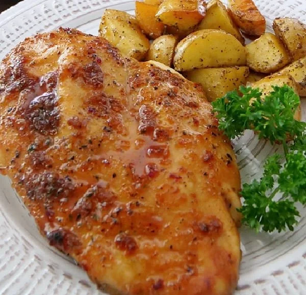 Sheet Pan Honey Glazed Chicken served with roasted potatoes