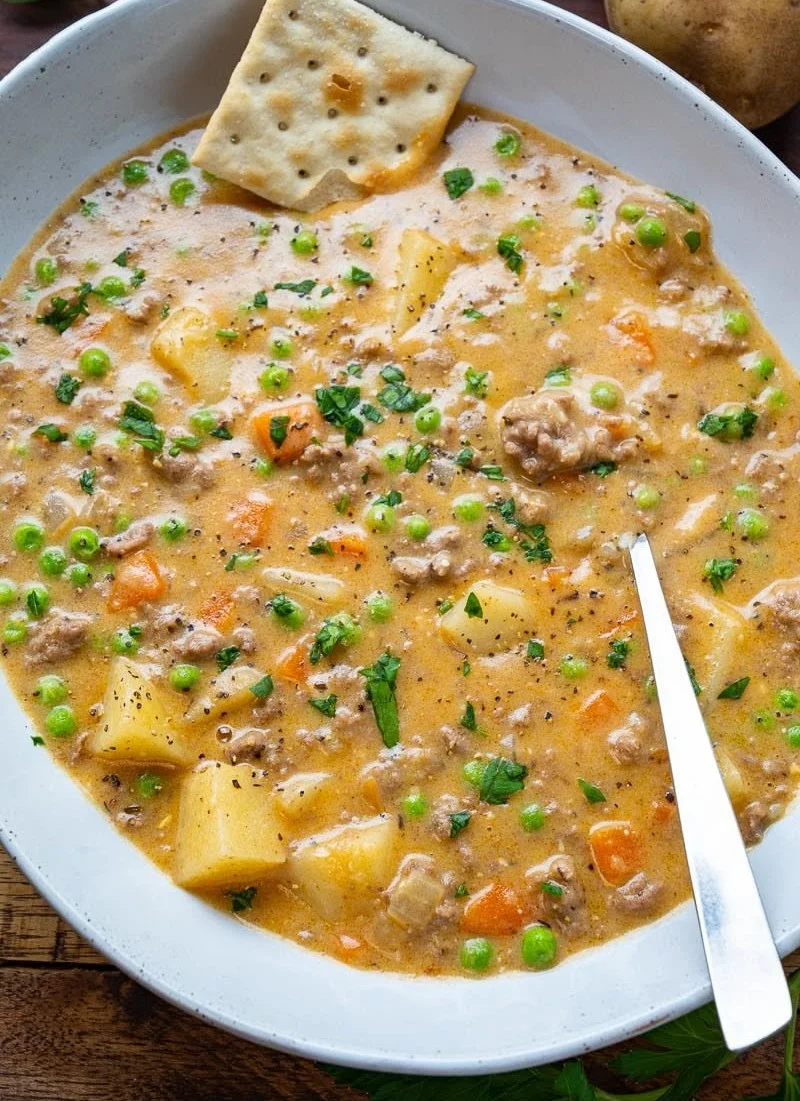 Delicious bowl of Shepherd's Pie Soup garnished with herbs and vegetables
