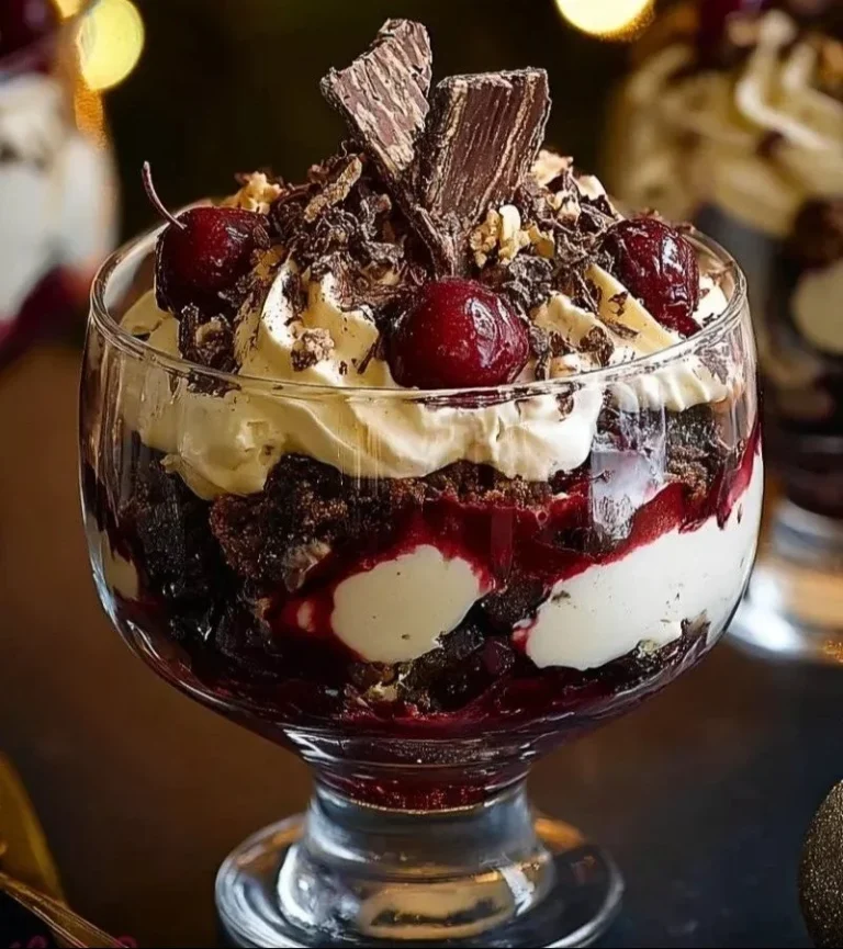 Delicious Black Forest Christmas Trifle with layers of chocolate and cherries