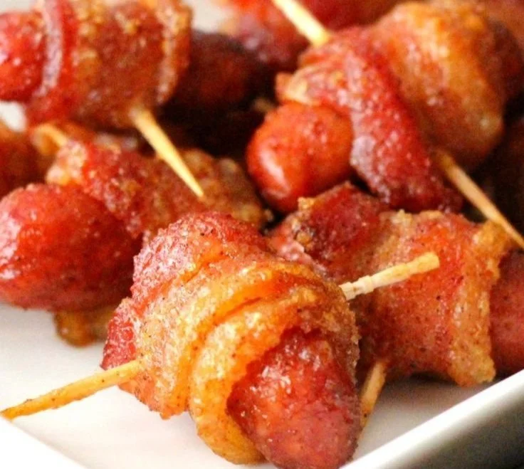 Delicious brown sugar bacon-wrapped smokies appetizer on a platter