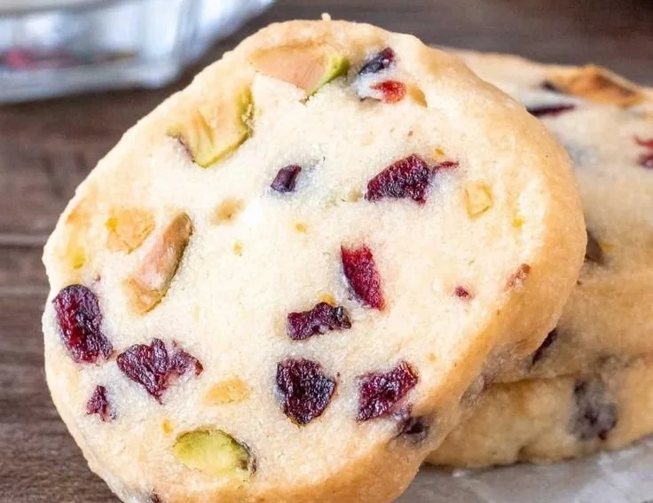 Delicious Cranberry Pistachio Shortbread cookies on a decorative plate