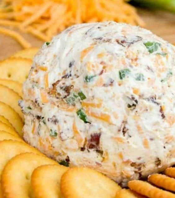 Creamy ranch cheddar cheeseball appetizer on a serving platter