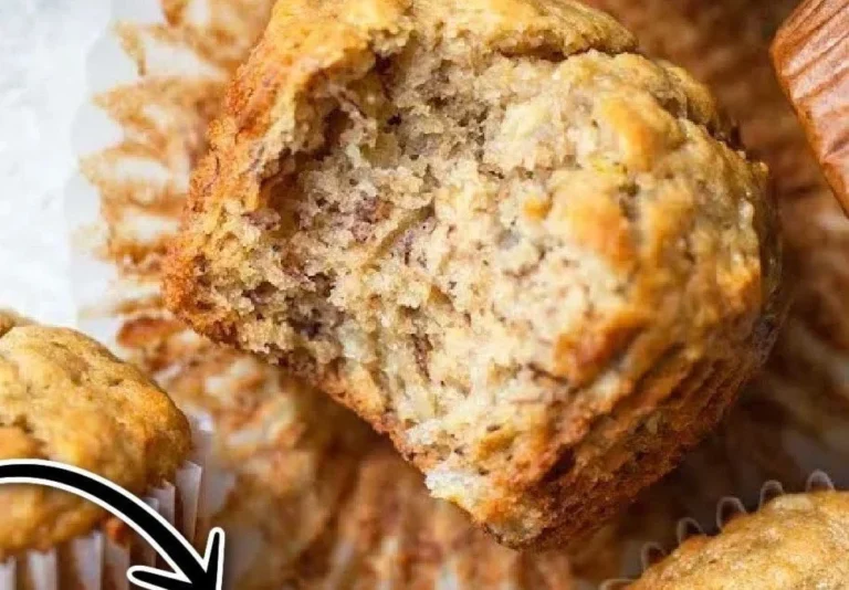 Freshly baked easy banana muffins on a wooden table