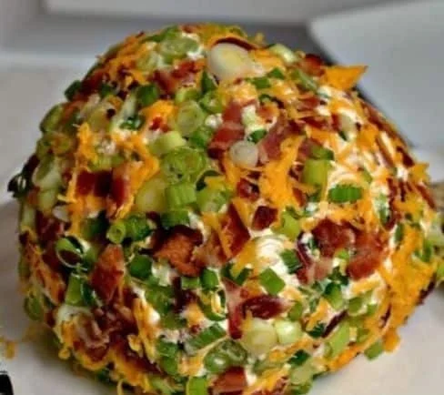 Jalapeno Popper Cheese Ball ready for serving at a party
