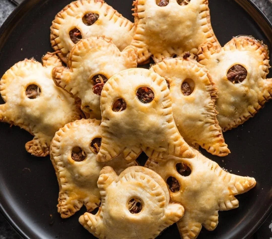 Mini taco pies recipe with a ghost theme for Halloween festivities.