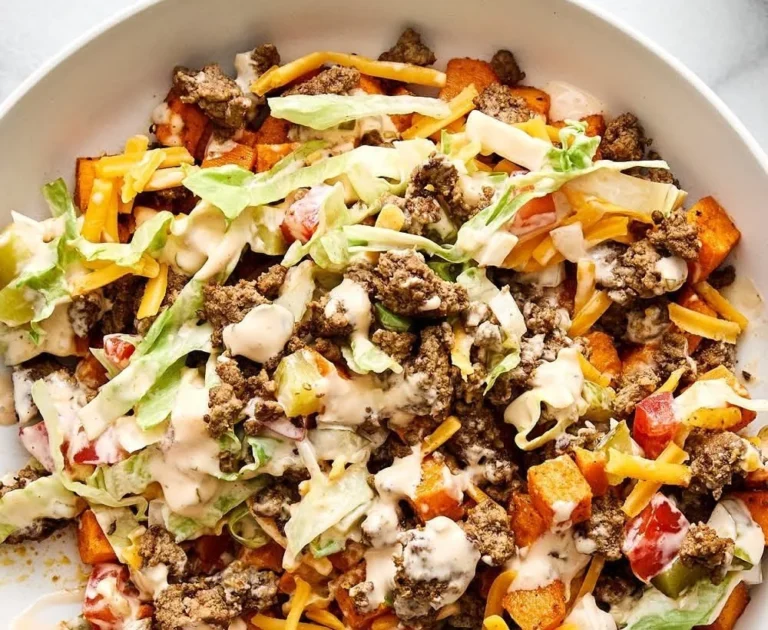 Sweet Potato Beef Burger Bowl topped with fresh ingredients and served in a bowl