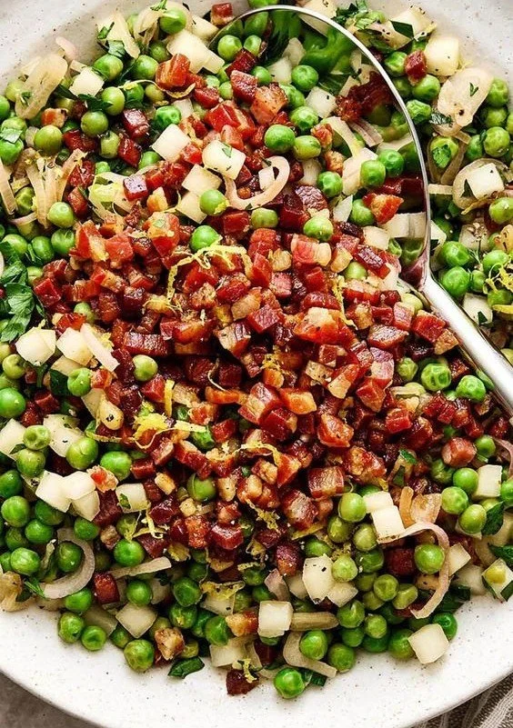 Delicious Thanksgiving peas side dish preparing on a festive table
